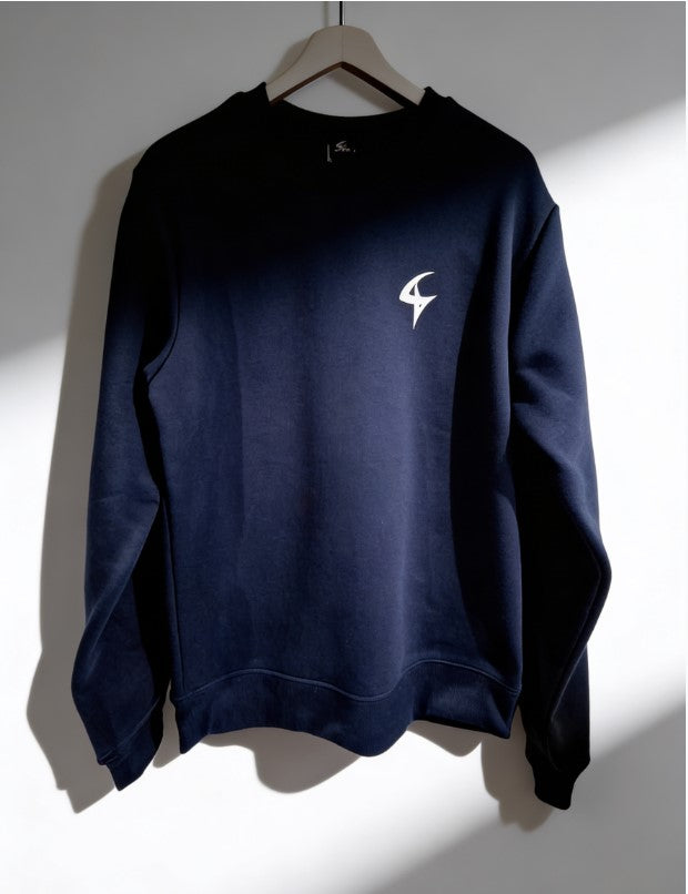 Navy blue sweatshirt with a white logo on a hanger against a light background